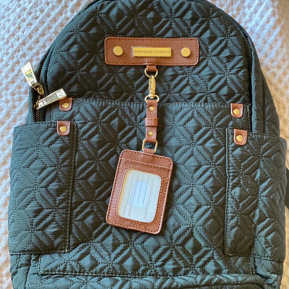 Never used Adrienne Vittadini quilted backpack Green w rust interior